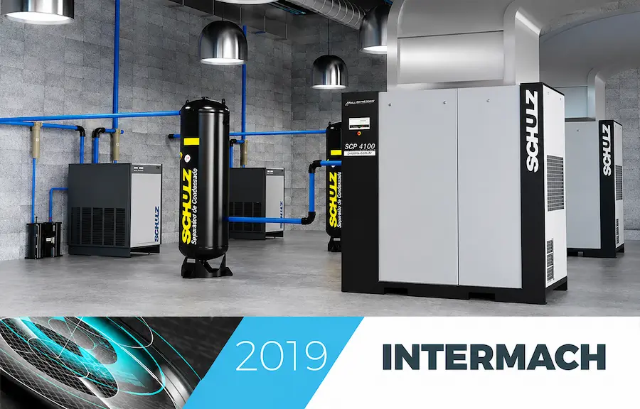 Sistema industrial de ar comprimido com compressores, reservatórios e equipamentos Schülz instalados em ambiente fabril.